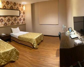 Home Full Hotel - Jincheng Township - Camera da letto