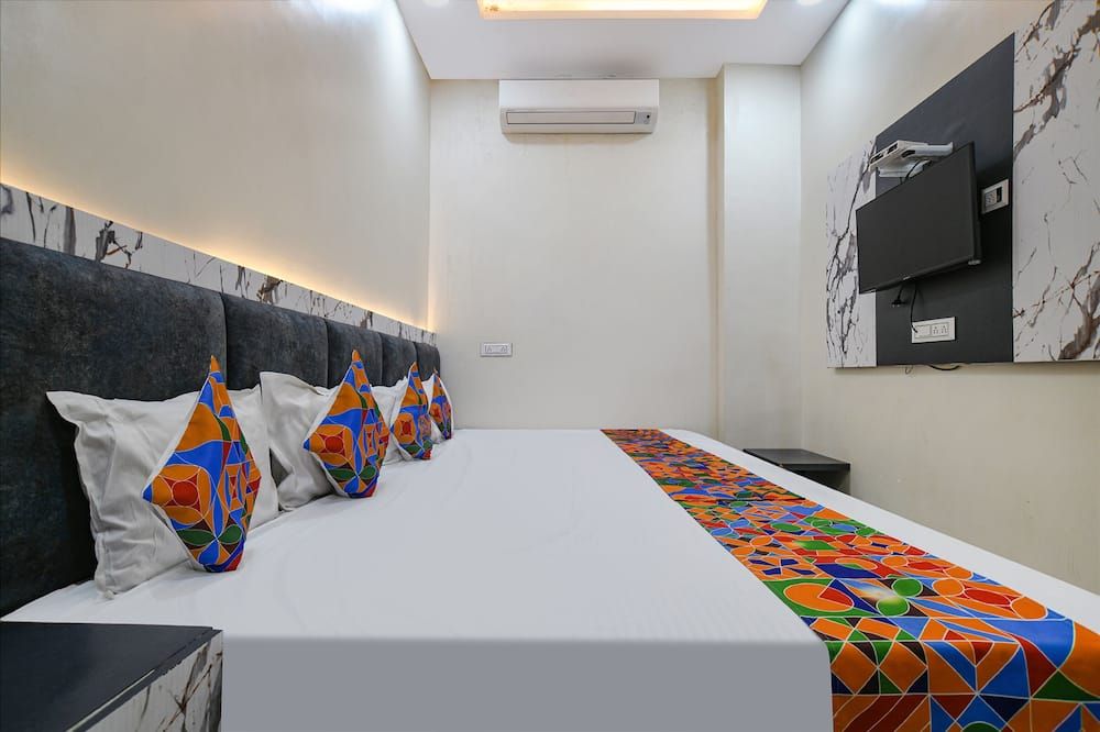 Fabhotel Orbit Homestay - אויאיין - חדר שינה