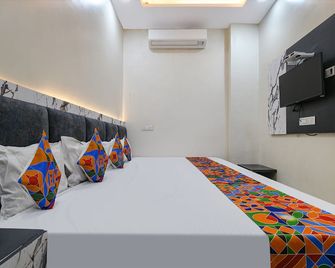 Fabhotel Orbit Homestay - אויאיין - חדר שינה