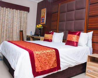 Golden Tulip Hotel- Evergreen Port Harcourt - Порт Харкорт - Спальня