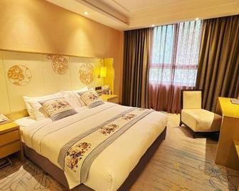 Deyang Defulai Hotel - Deyang - Bedroom