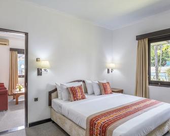 Jimbarwana Hotel - Negara - Bedroom