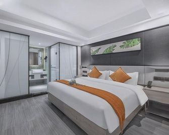 Upandin Hotel (Huaihua South of High-speed Railway Station) - Huaihua - Bedroom