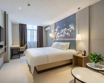 Magnotel Shanhai Hongkou Football Stadium - Shanghai - Bedroom