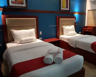 Cherry Midtown Hotel - Olongapo - Спальня