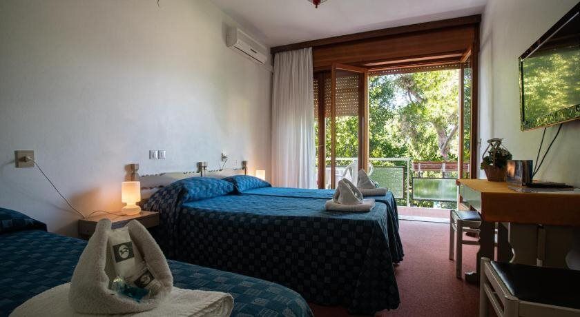 Hotel Adriaco - غرادو - غرفة نوم