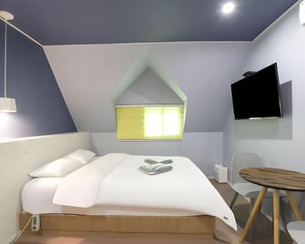 Daejeon Yongmun Stay-Q Hotel - Daejeon - Schlafzimmer