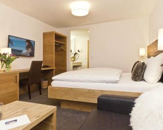 Waldpark Hotel Garni - זאמנאון - חדר שינה