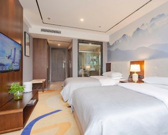 Hualv Hotel - Liangshan - Slaapkamer