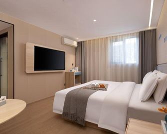 Home Inn - Zhangjiajie Jishou University Seventy-two Qilou - Zhangjiajie - Bedroom