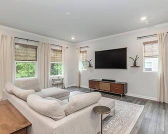 Family Friendly with Sunroom & Game Room\n\n - Garner - Living room