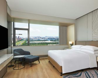 Courtyard by Marriott Changchun - Changchun - Slaapkamer