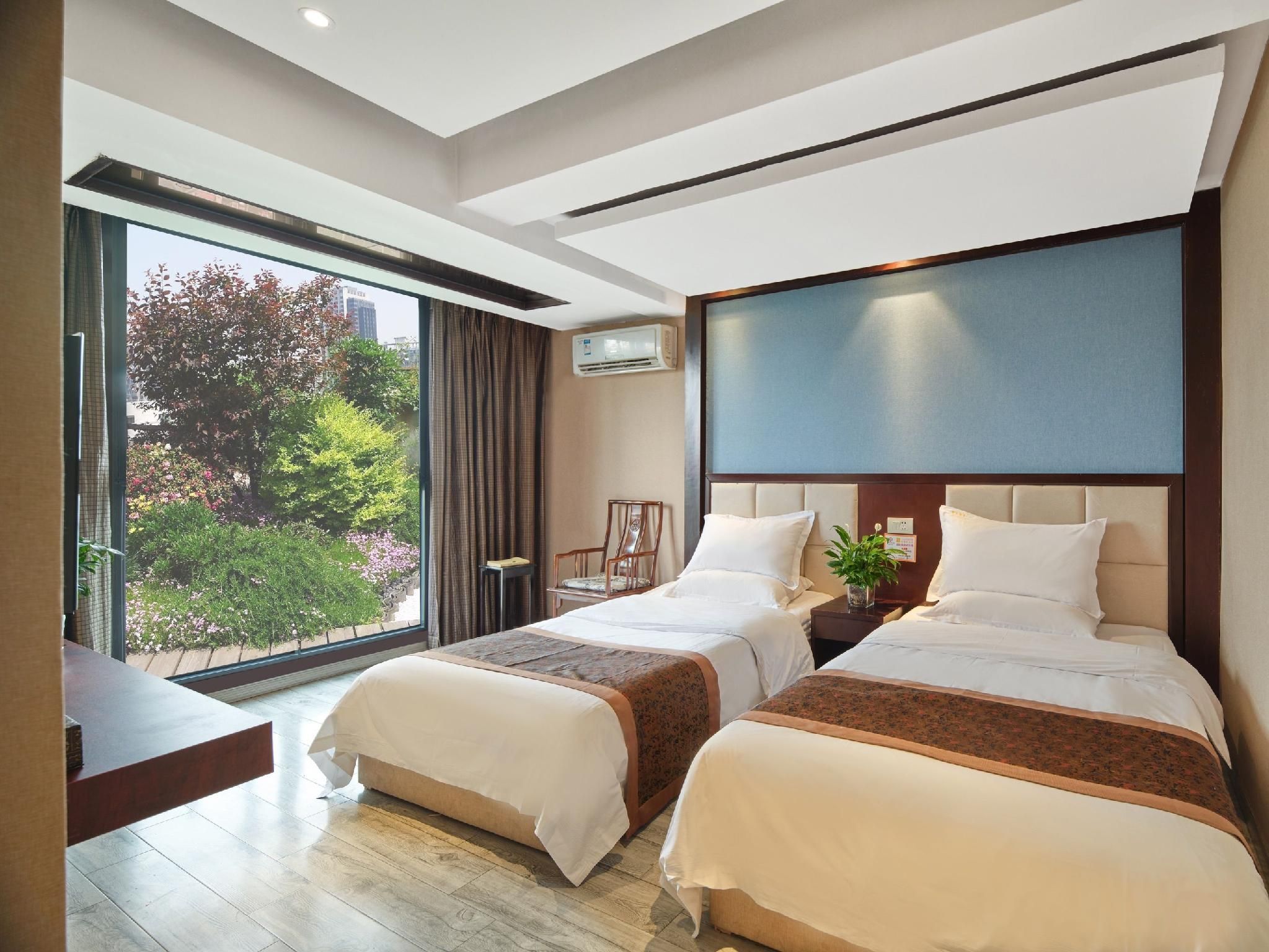Liangyuan Sanguo Wenhua Hotel - Mianyang - Camera da letto