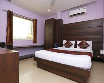 Collection O City Star - Raipur - Bedroom