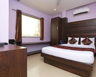Collection O City Star - Raipur - Habitación
