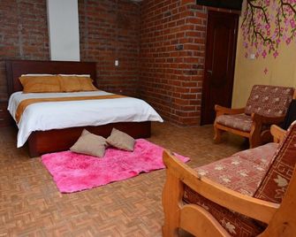 Las Orquídeas Runtun - Baños - Schlafzimmer