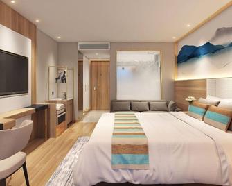 Greentree Inn Chongqing Longhu Times Tianjie Xietaizi Metro Station - Chongqing - Bedroom