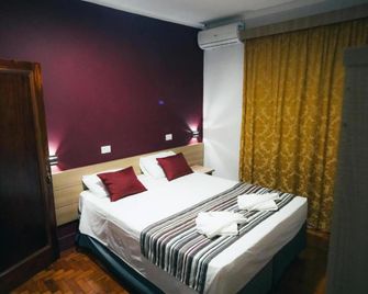 Hotel Euro Suite Poços de Caldas By Nacional Inn - Poços de Caldas - Soveværelse