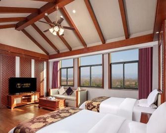 Yimi Sunshine Boutique Hotel (Xichang Qionghai Wetland Park) - Ляншань - Спальня