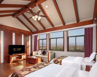 Yimi Sunshine Boutique Hotel (Xichang Qionghai Wetland Park) - Liangshan - Bedroom