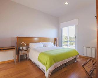 Amalinas Hotel - San Lorenzo - Спальня