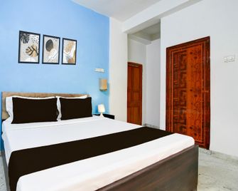 Hotel O Anandapur Near Annapurna Garden - Kolkata - Schlafzimmer