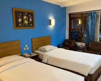 Hotel Lestari - Jember - Спальня