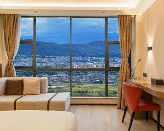 Mre Jade Crown Jianguo Hotel - Baoshan - Slaapkamer