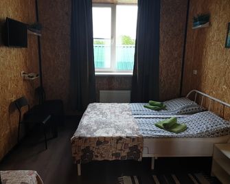 Hostel Tri Chemodana - קיסלובודסק - חדר שינה