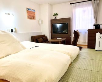 Business Hotel Raicho - Koshigaya - Camera da letto