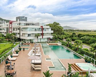 Apto no cond Thai Beach Home Spa frente mar TBS106 - Florianópolis