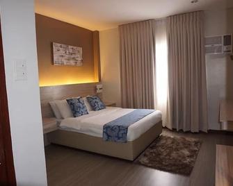 Palau Hotel - San Carlos - Camera da letto