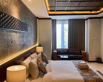 djabu Seminyak Hotel - North Kuta - חדר שינה