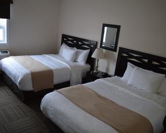 Auberge Macdonald Guest Inn - Iroquois Falls - Bedroom