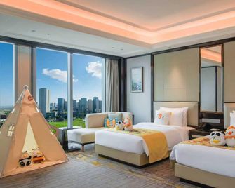 Nanjing Fengda International Hotel - Nanjing - Schlafzimmer