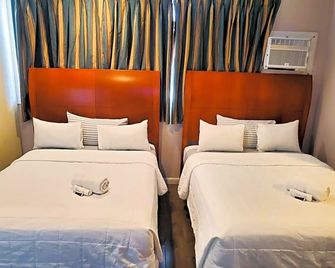 Miami Springs Inn - מיאמי ספרינגס - חדר שינה