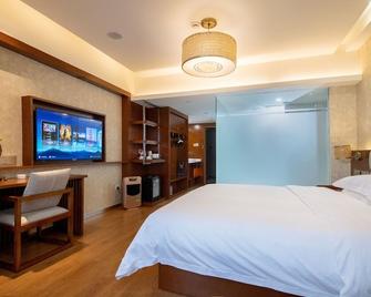 Infully Hotel - Zigong - Zigong - Bedroom