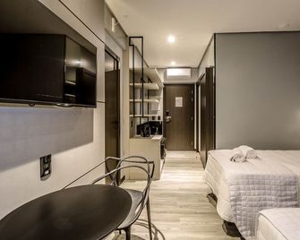 Tri Hotel Premium Itapema - Itapema - Schlafzimmer