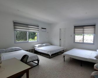 Malinao Retreat and Camping Resort Albay by RedDoorz - Tabaco - Bedroom