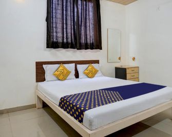 Hotel O Angan Hotel - Пуна - Спальня