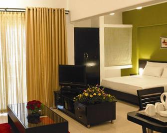 Royal Orchid Golden Suites Pune - Pune - Yatak Odası