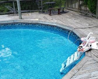 Summer winding down book for fall color change and hunting season now - Mount Ida - Pool