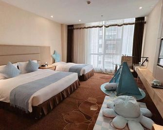 Yin Tong Crown Holiday Hotel - Fuxin - Bedroom