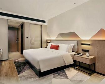 Borrman Hotel Danyang Gaoxin District Zhenxing Road - Zhenjiang - Camera da letto