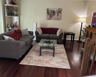 The Ascent Residence - Herndon - Living room