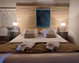 Hotel Antiguo Camino - וילה ג'נרל בלגראנו - חדר שינה