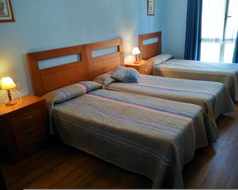 Hotel Aguila Real - กันกัส เด โอนิส - ห้องนอน
