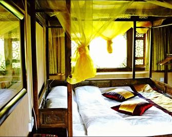 Lijiang Baisha Holiday Resort - Lijiang - Bedroom
