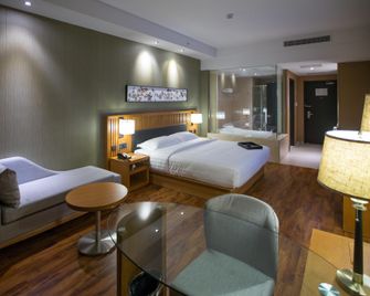 Crystal Orange Hotel Nanjing Olympic Sports Zhongsheng International Expo Center - נאנז'ינג - חדר שינה