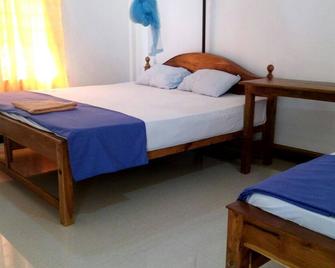 French Garden Resort - Trincomalee - Schlafzimmer